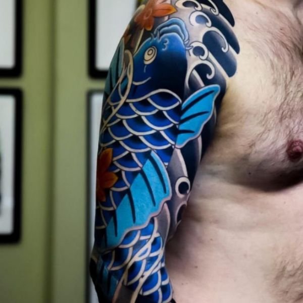 Tattoo cá chép hóa rồng trên bắp tay