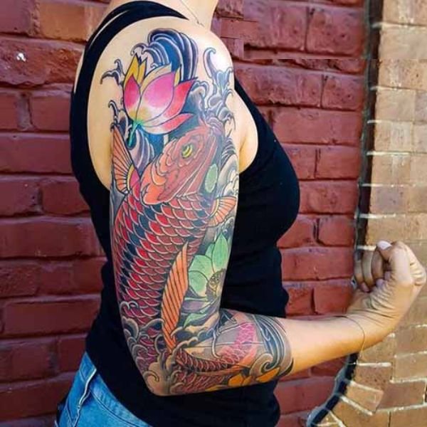 Tattoo cá chép hoa sen cho nữ