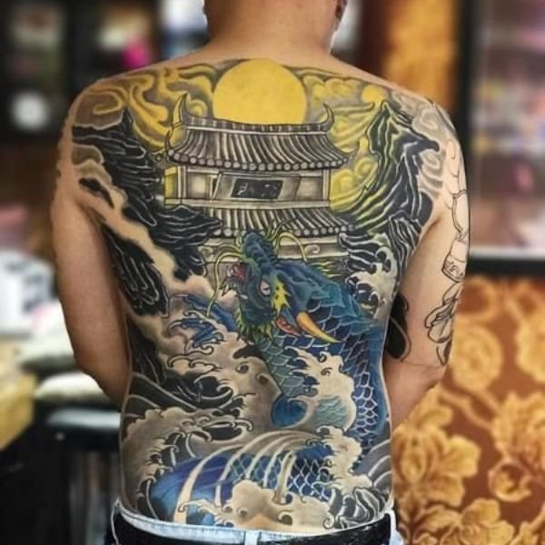 Tattoo cá chép kín lưng màu xanh