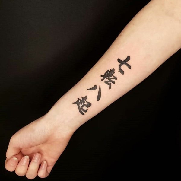 Tattoo chữ tàu bình an cô sự