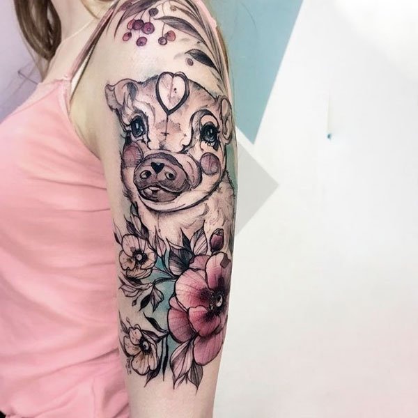 Tattoo con heo bắp tay đẹp cho nữ