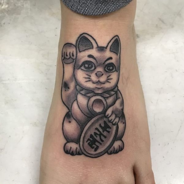 Tattoo con mèo thần tài