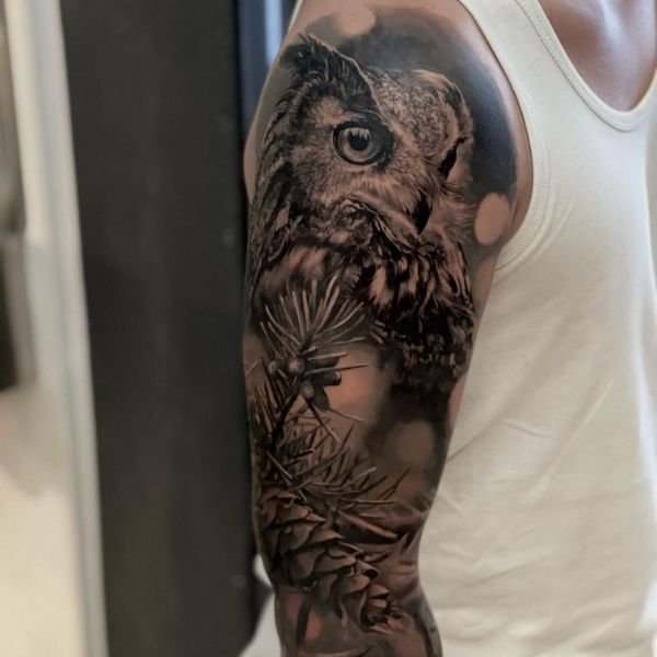 Tattoo cú mèo bắp tay