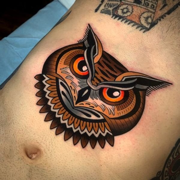 Tattoo cú mèo ở bụng