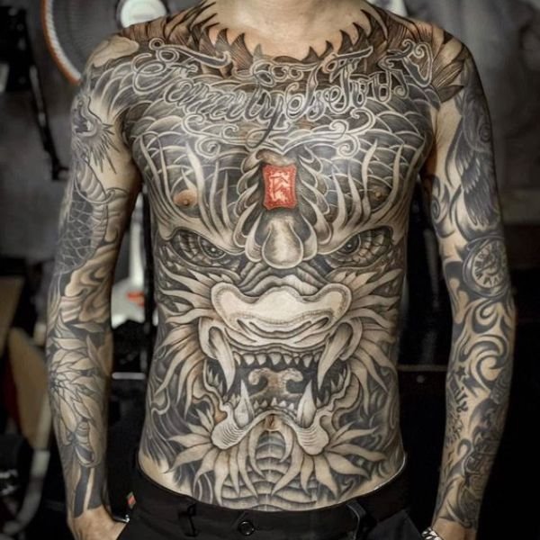 Tattoo đầu rồng bít bụng