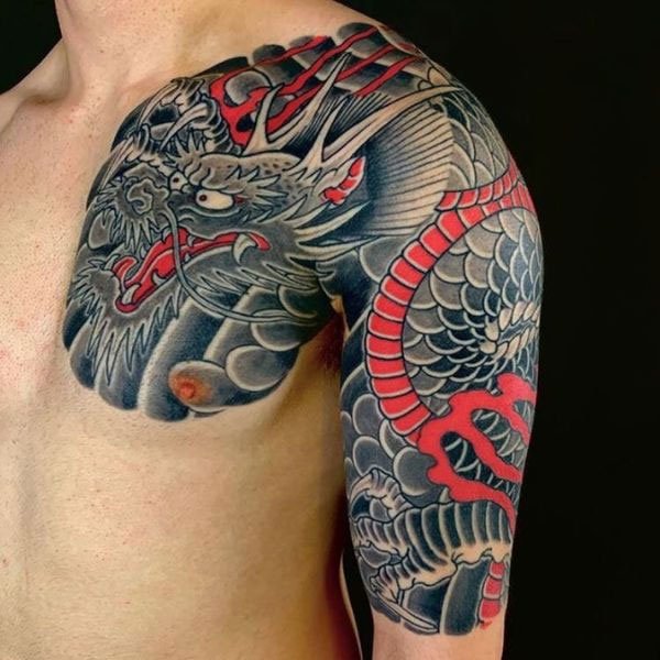 Tattoo mệnh thổ rồng quấn vai