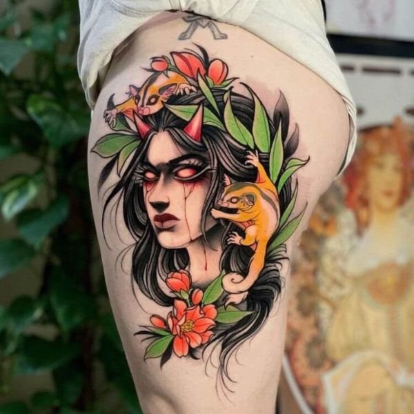 Tattoo ở dùi cho nữ cô gái