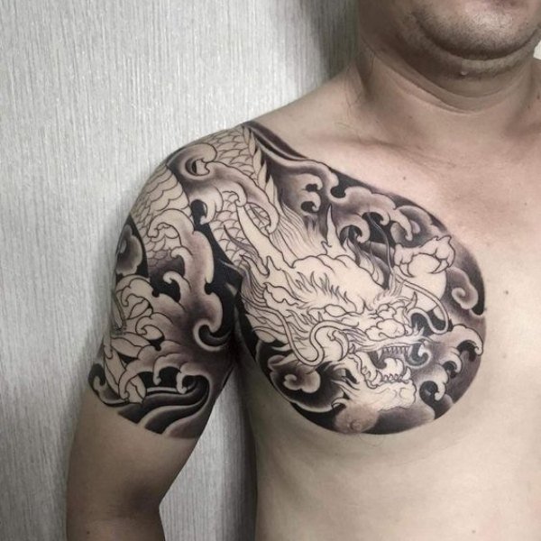 Tattoo rồng há mồm vắt vai