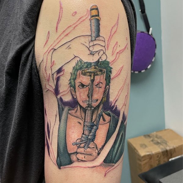 Tattoo zoro rút kiếm