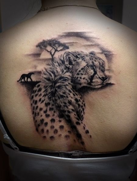 mẫu tattoo báo hoa mai full lưng