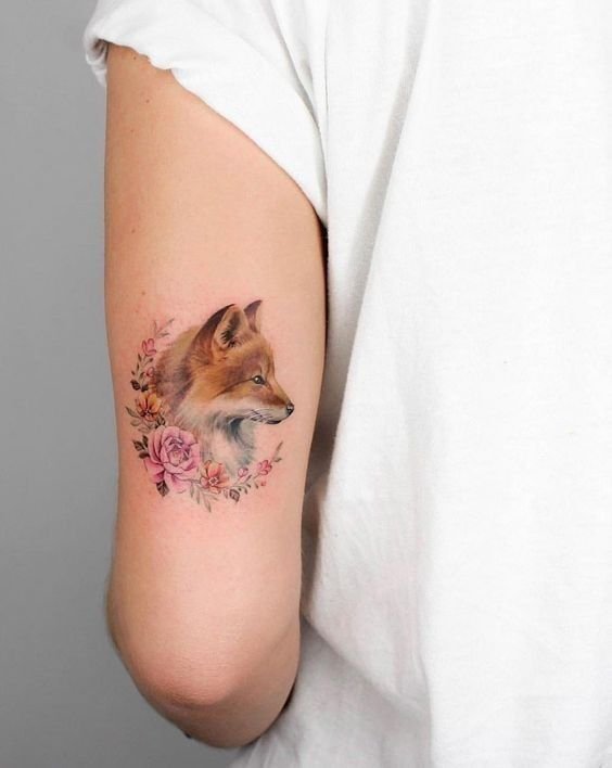 mẫu tattoo con cáo xăm trên bắp tay