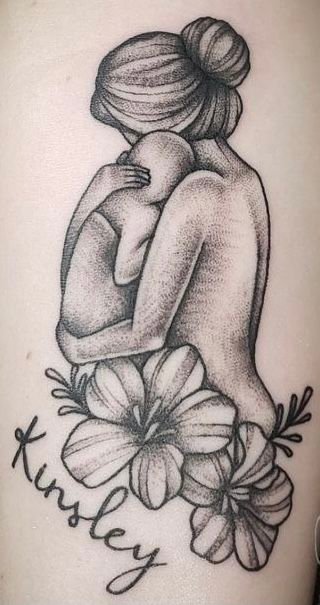 hình tattoo mẹ bồng con có họa tiết hoa