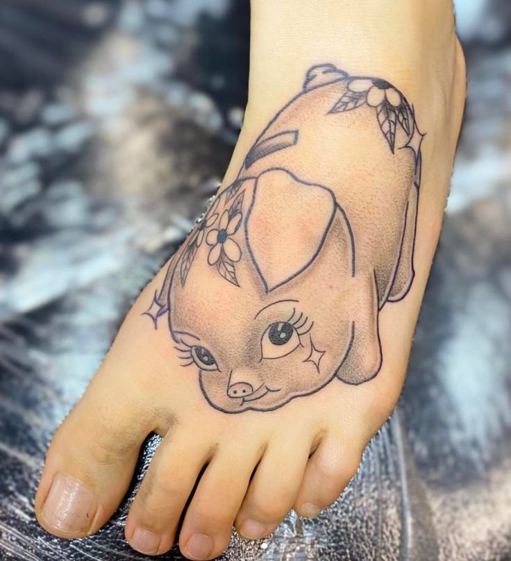 mẫu tattoo mu bàn chân ống heo tiết kiệm