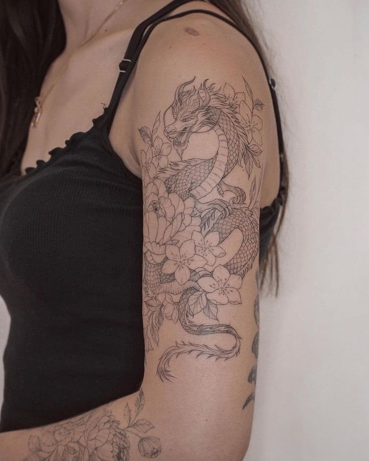 tatto hình rồng ở bắp tay