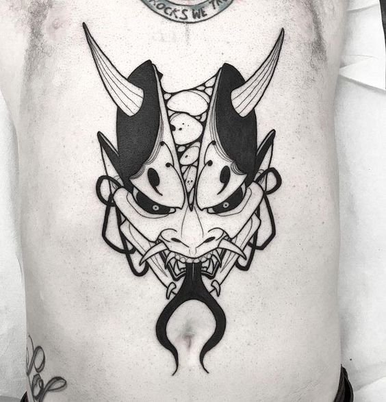 tattoo mini đầu quỷ dạ xoa lè lưỡi